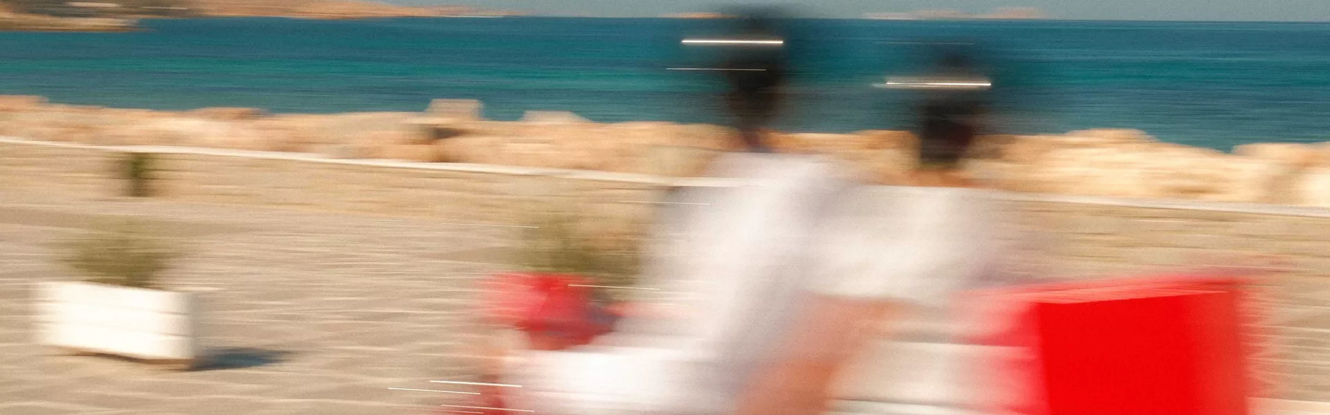 Blurred Motorbike Going Past Beach