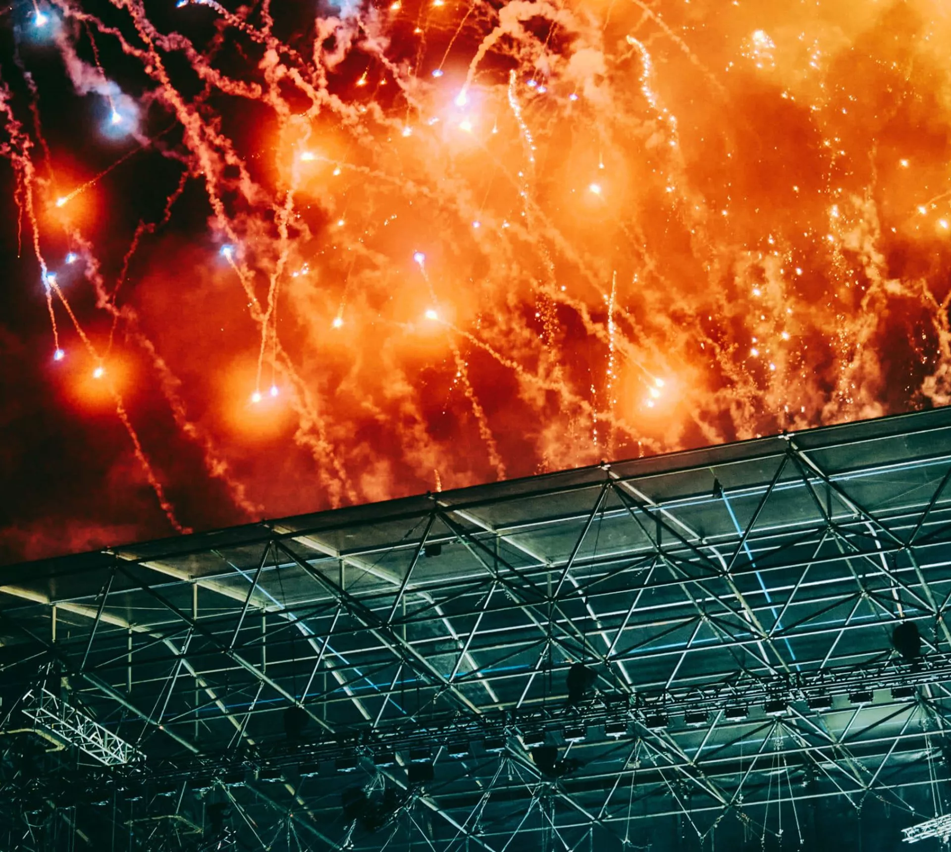 Spectacular fireworks exploding over the main stage at Ultra Music Festival in Split Croatia at night - Contiki Croatia Sail & Ultra Music Festival Tour