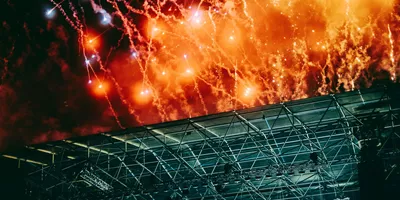 Spectacular fireworks exploding over the main stage at Ultra Music Festival in Split Croatia at night - Contiki Croatia Sail & Ultra Music Festival Tour