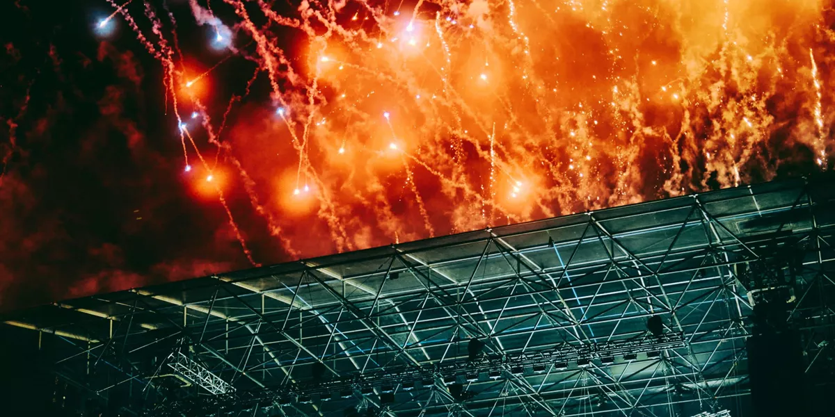 Spectacular fireworks exploding over the main stage at Ultra Music Festival in Split Croatia at night - Contiki Croatia Sail & Ultra Music Festival Tour