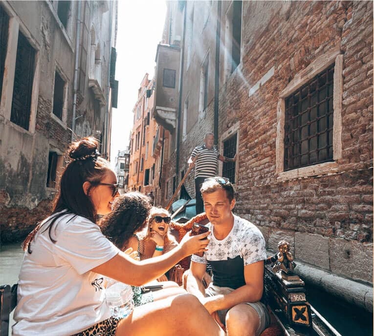Cultural Experiences travellers in gondola, Venice