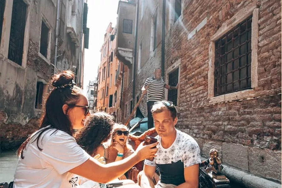 Cultural Experiences travellers in gondola, Venice