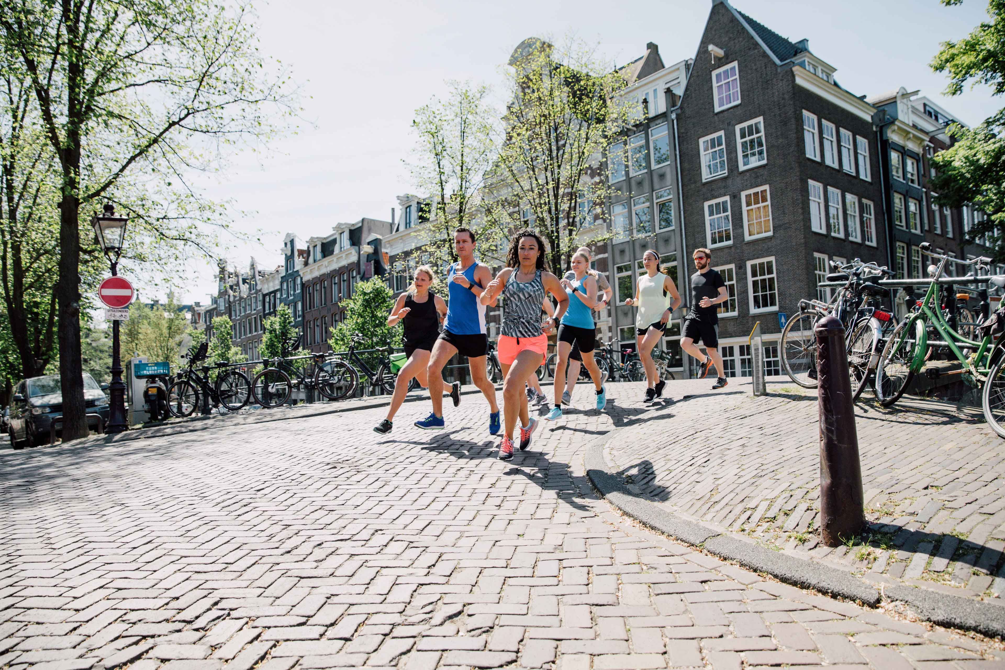 Group of people running in Amsterdam, Netherlands.