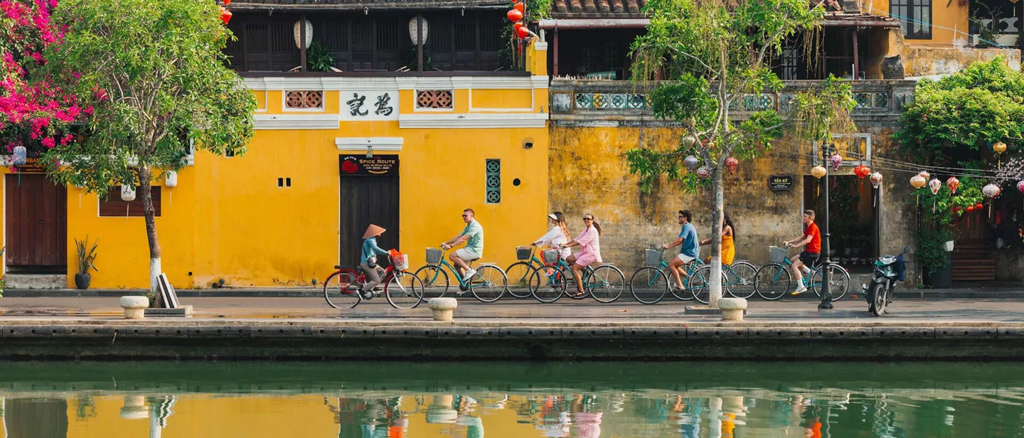 Group Of Young People Riding Bikes Vietnam Road