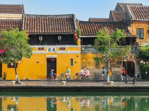 Group Of Young People Riding Bikes Vietnam Road