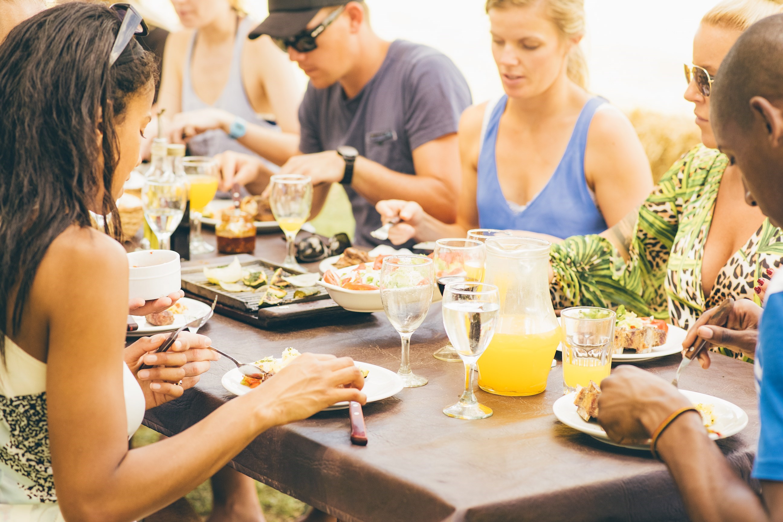 Travellers eating a local meal in Buenos Aires, Argentina