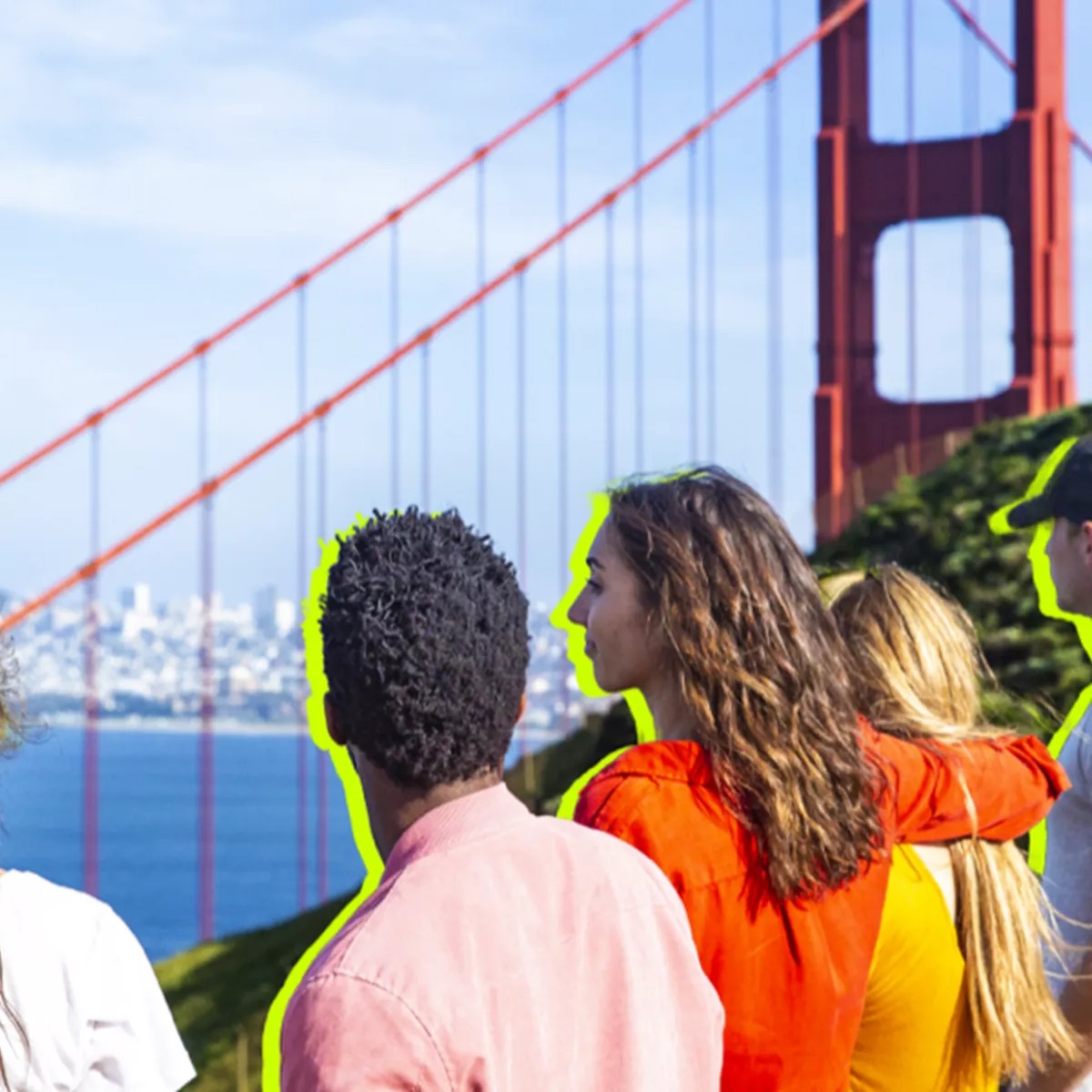 Group of tourists in front of Golden Gate bridge in San Francisco, USA