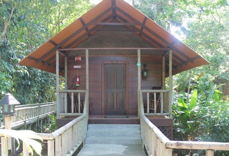 Wooden Wts lodge in a jungle in LAtin America