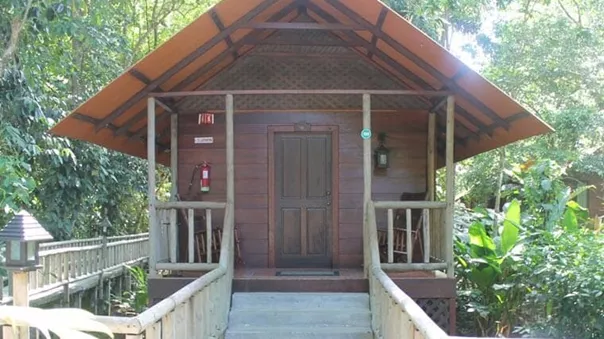 Wooden Wts lodge in a jungle in LAtin America