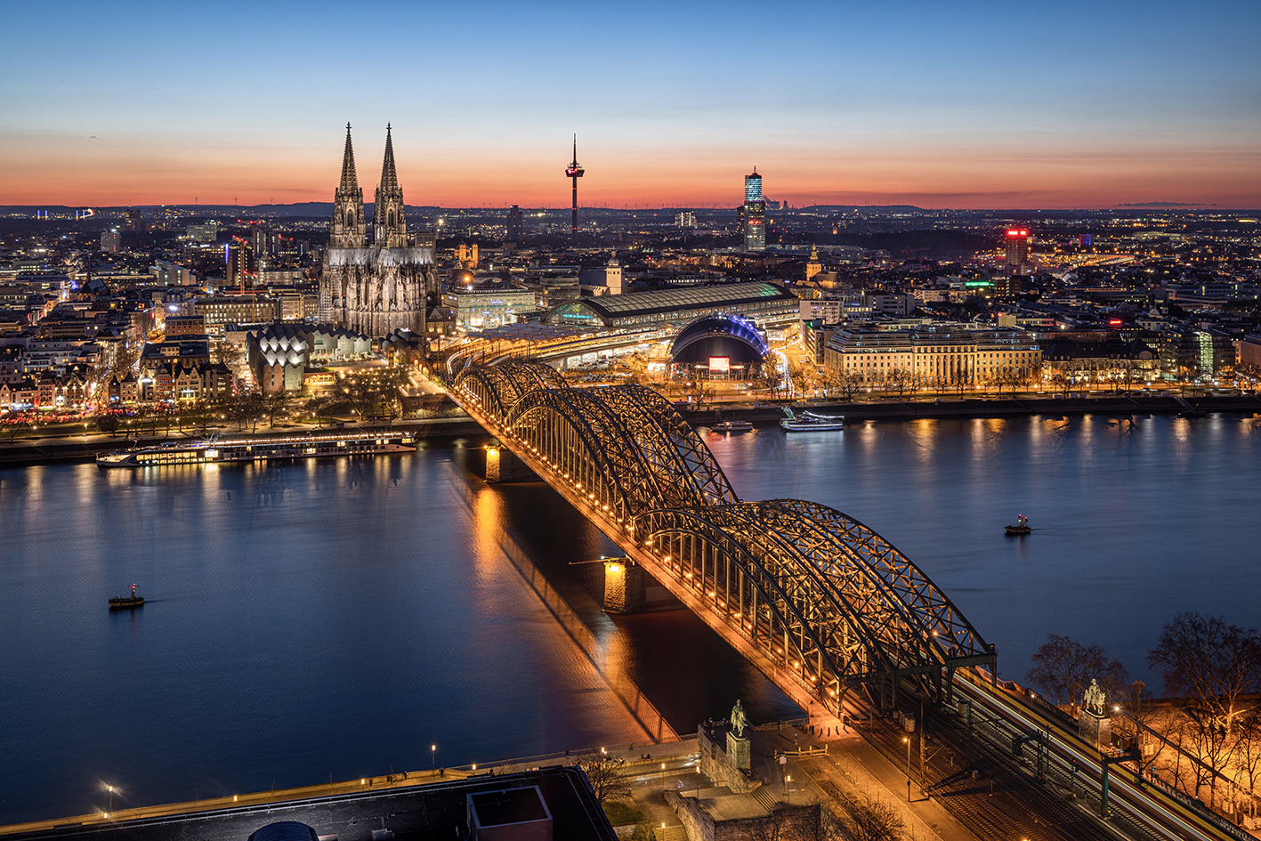 Birds eye view of Cologne lit up at night, Cologne, Germany