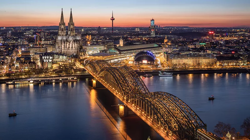 Birds eye view of Cologne lit up at night, Cologne, Germany