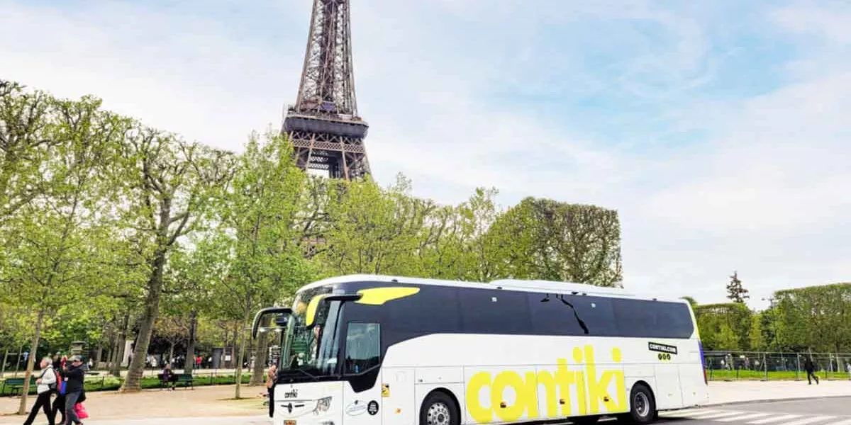 Contiki Coach In Front Of Effiel Tower Paris France