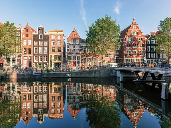 Buildings Reflected In Water In Netherlands