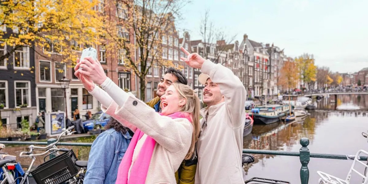 Friends Taking Photo In Amsterdam