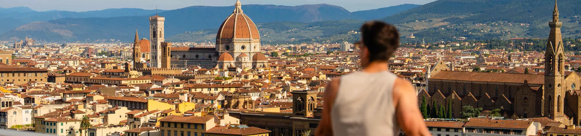 Male Taking In View Over European City