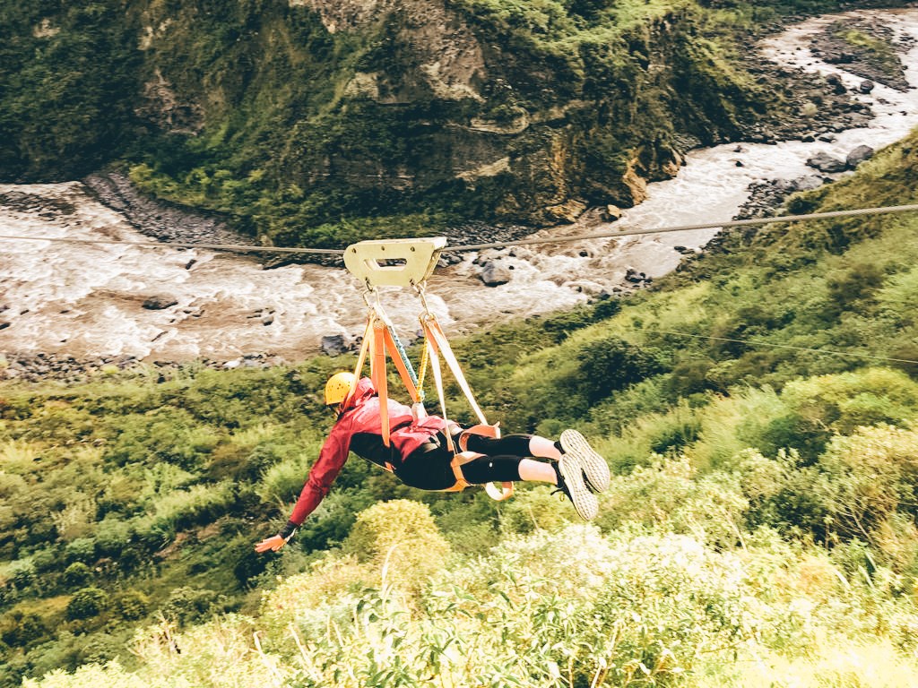 Traveller ziplining in Banos, Ecuador