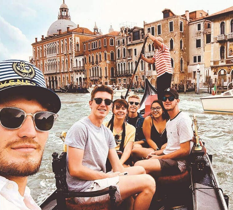 Tourists on the boat taking a selfie