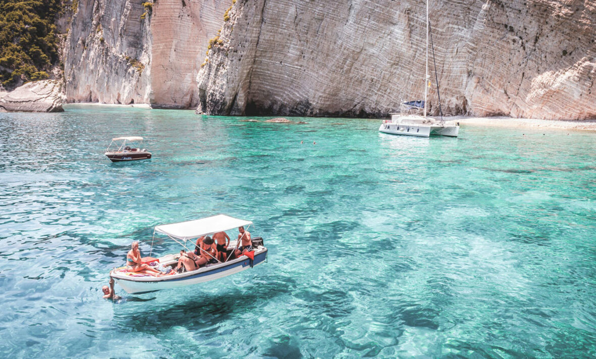 People On Boat In Greece