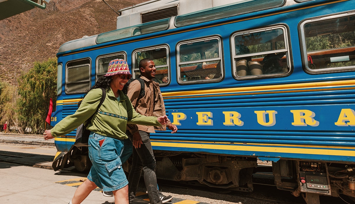 smallgroup-card-travellers-run-for-train-peru.jpg