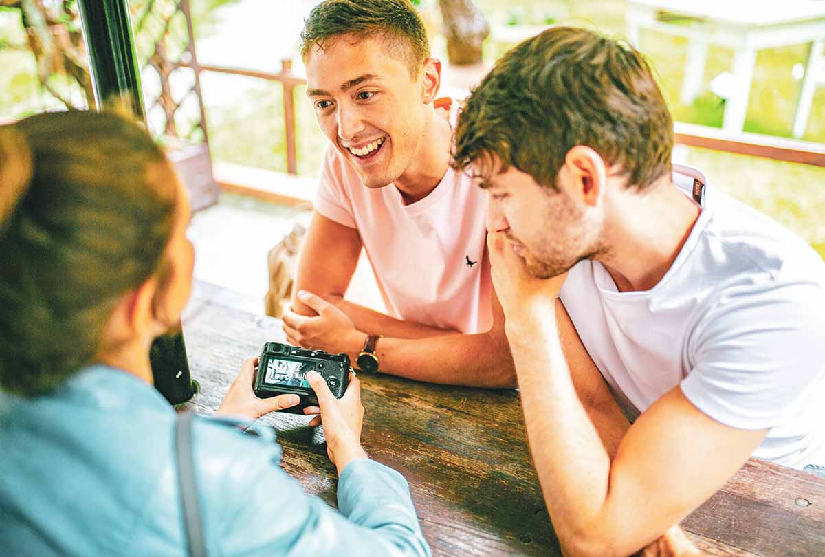 Three people talking to each other
