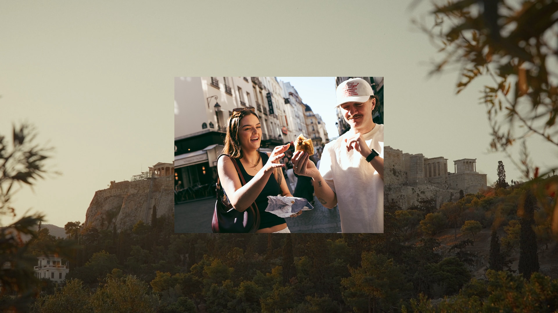 originals-hero-two-people-eating-croissant-paris.jpg