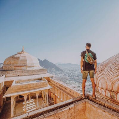 Traveller admiring view of city and the landscape, Asia
