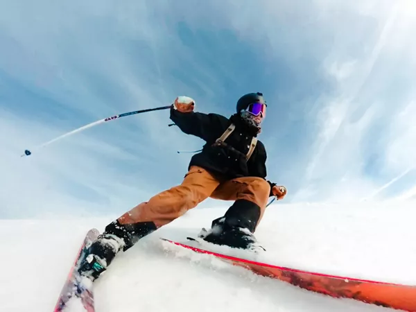 person skiing snow clear sky