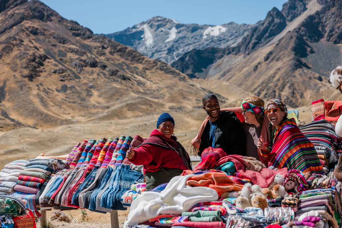 Travelers In Peru With Local