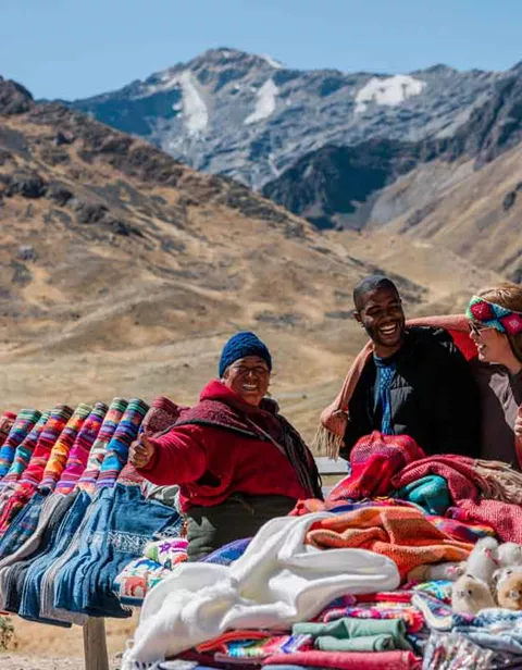 Travelers In Peru With Local
