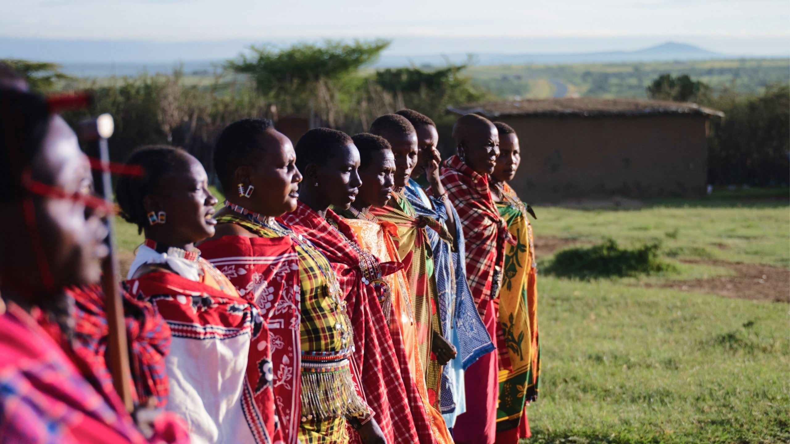 Maasai community members in traditional dress - Contiki's Uganda Gorillas & Maasai Mara Tour