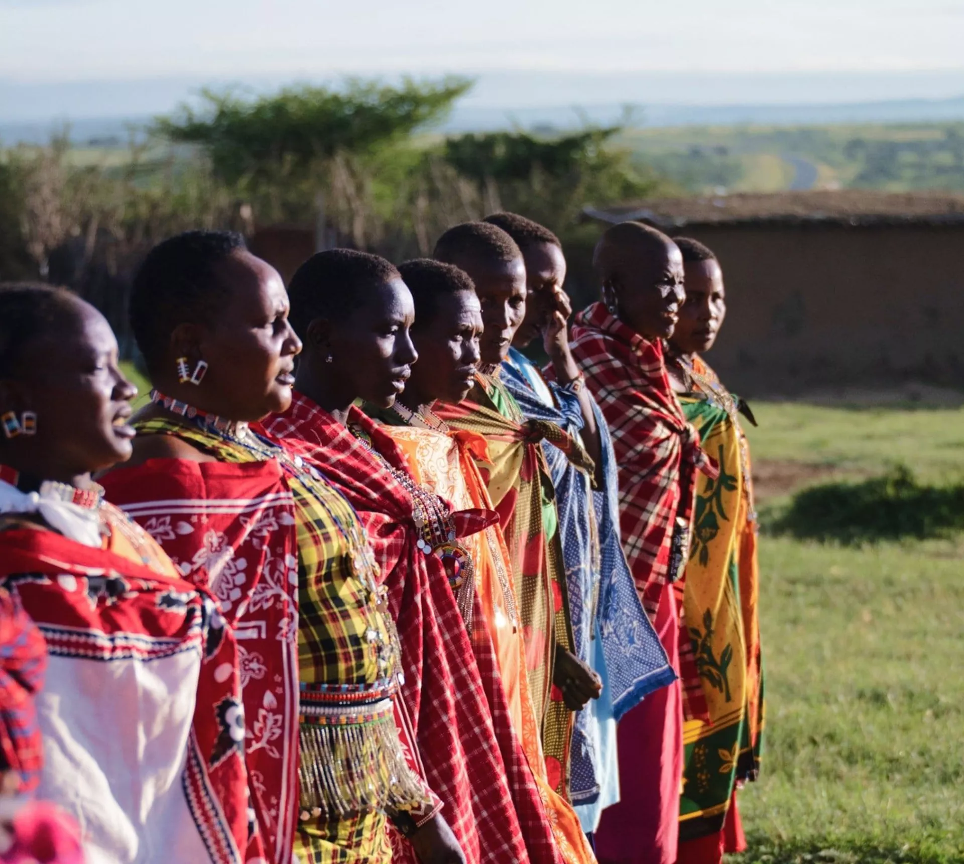 Maasai community members in traditional dress - Contiki's Uganda Gorillas & Maasai Mara Tour