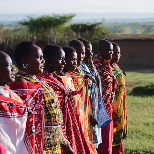 Maasai community members in traditional dress - Contiki's Uganda Gorillas & Maasai Mara Tour
