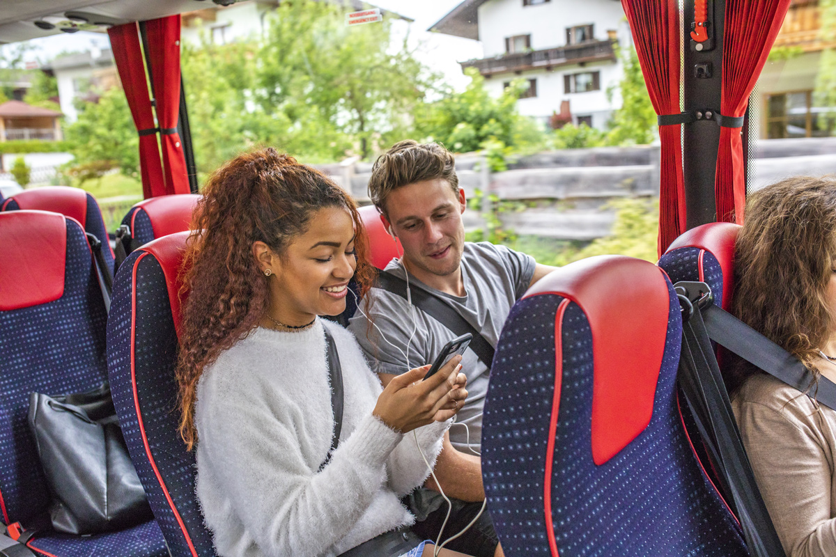 People Lauging In Contiki Coach