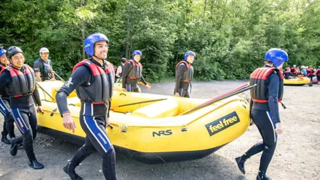 Young Group Of Adventurers Rafting Croatia