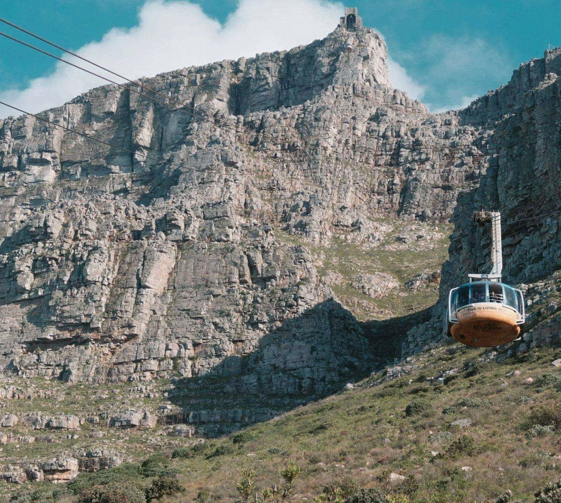 Table Mountain Aerial Cableway climbs the cliffs of Table Mountain in Cape Town, South Africa - Contiki's Cape Town Mini Break Tour