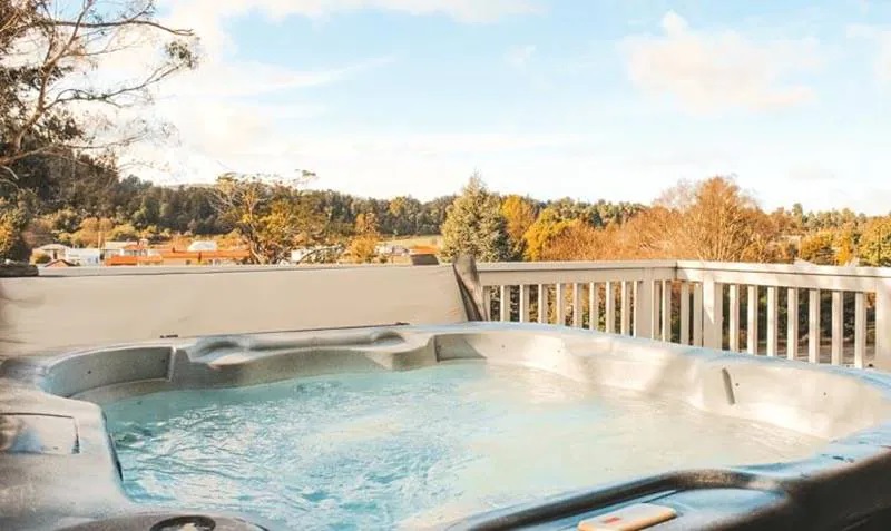 Outdoor jacuzzi surrounded by nature