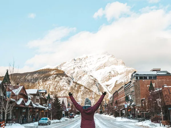 Person Walking On Snowy Road