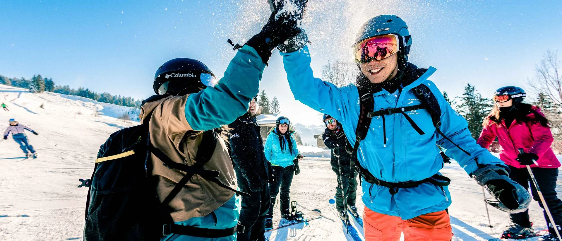 Hi Fiving Skiers Austria