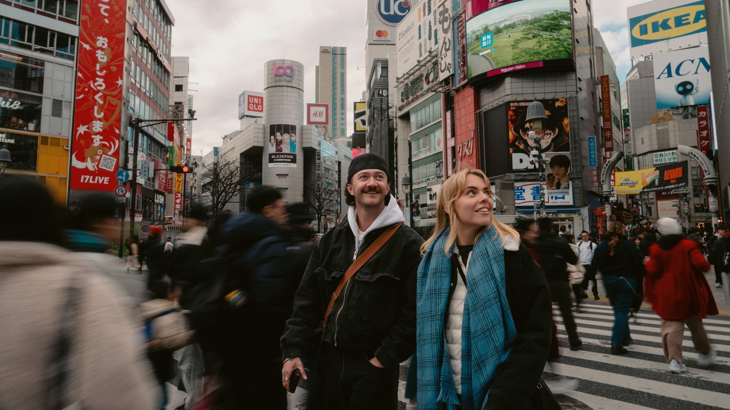 Contiki travellers experience the energy of Shibuya Crossing in Tokyo during Contiki's Japan in Winter by Train Tour