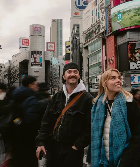 Contiki travellers experience the energy of Shibuya Crossing in Tokyo during Contiki's Japan in Winter by Train Tour