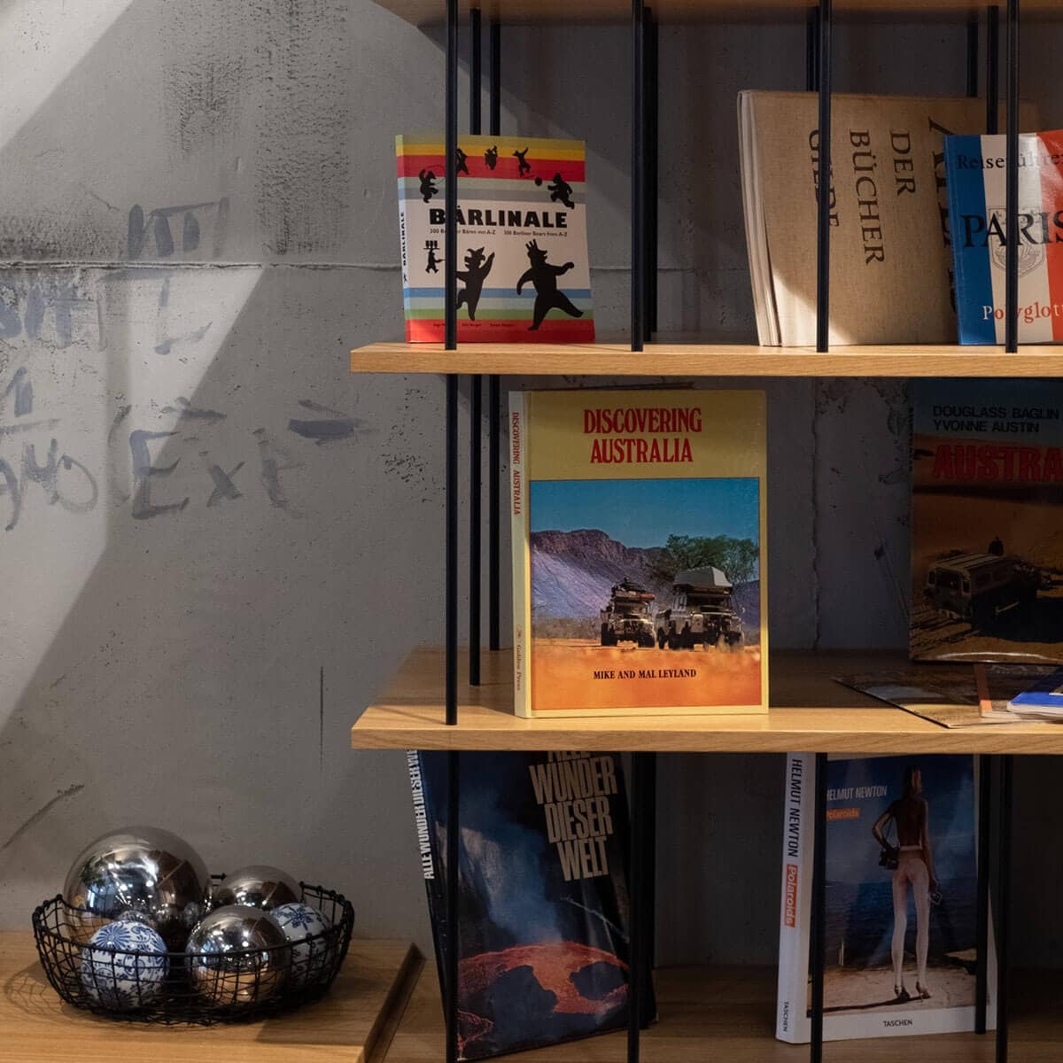 Moxy Hotel Berlin bookshelf with books and decorations