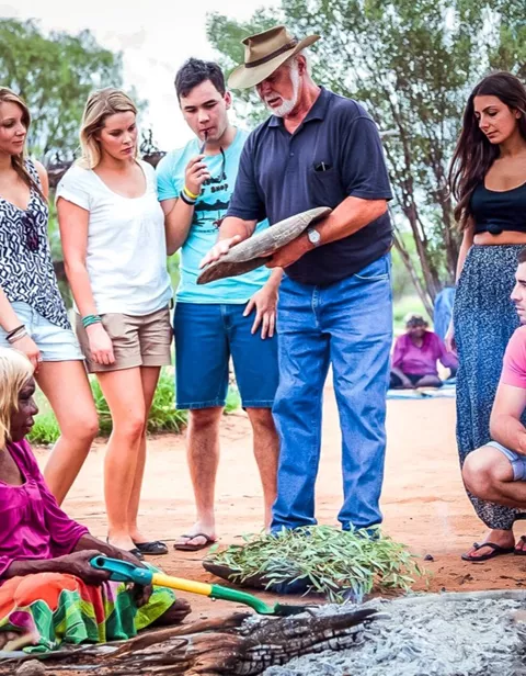 Group of travellers with Aboriginal hosts on a MTM Experience in Darwin, Australia