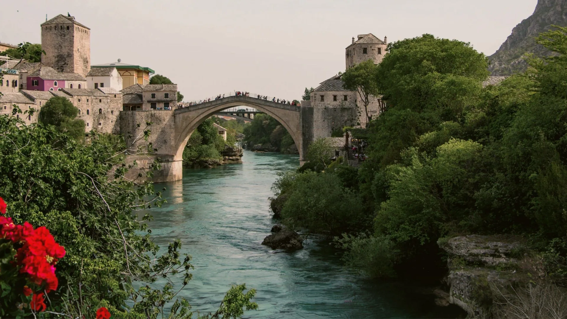 The iconic Stari Most bridge spans the Neretva River on the Contiki Dubrovnik to Budapest Tour