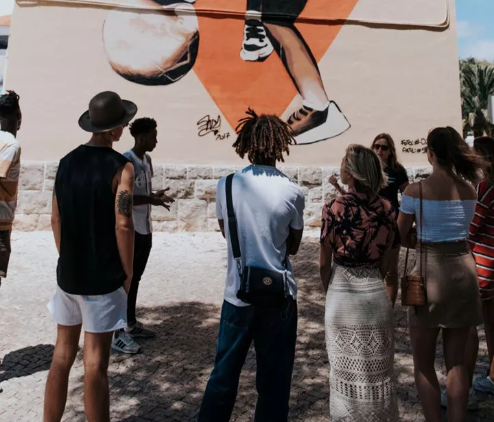 Group of travellers on a MTM experience walking tour in Cascais, Lisbon
