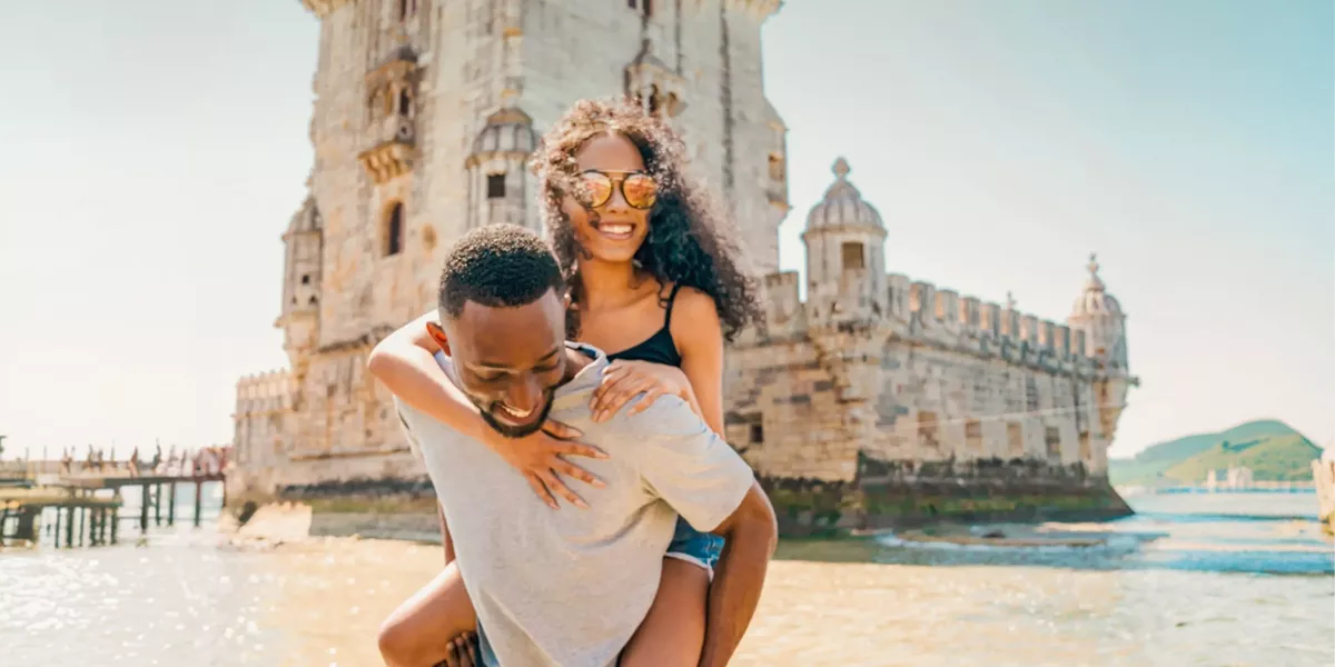 Two travellers exploring Belém Tower in Lisbon - Contiki Spain, Portugal & Morocco Trail Tour