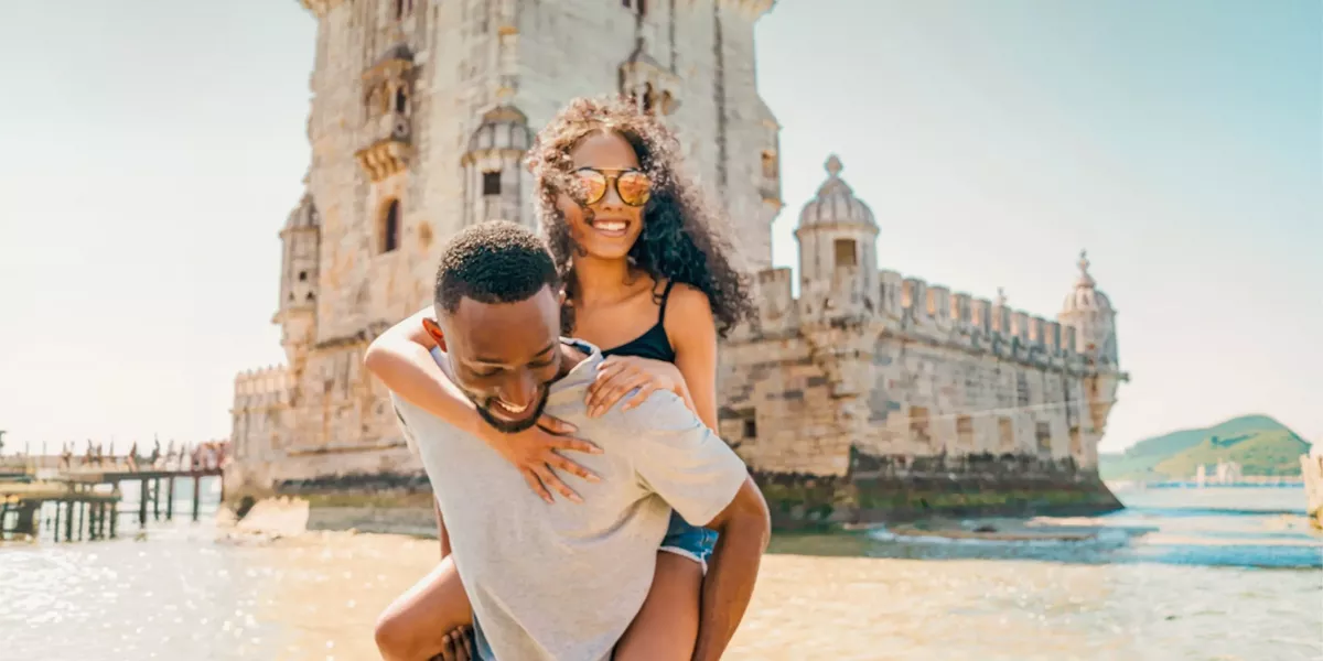 Two travellers exploring Belém Tower in Lisbon - Contiki Spain, Portugal & Morocco Trail Tour