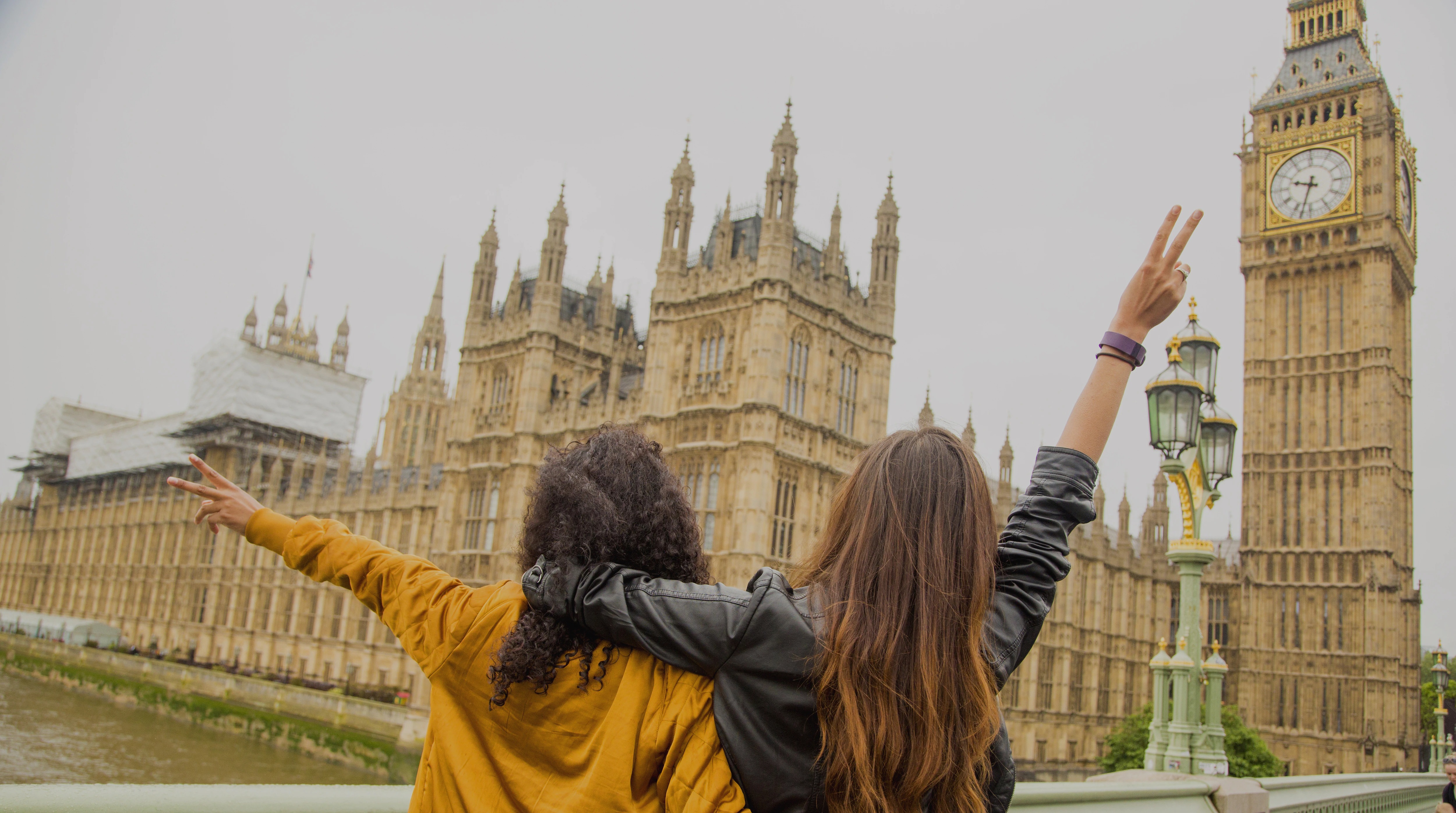 Travellers next to a Big Ben, London