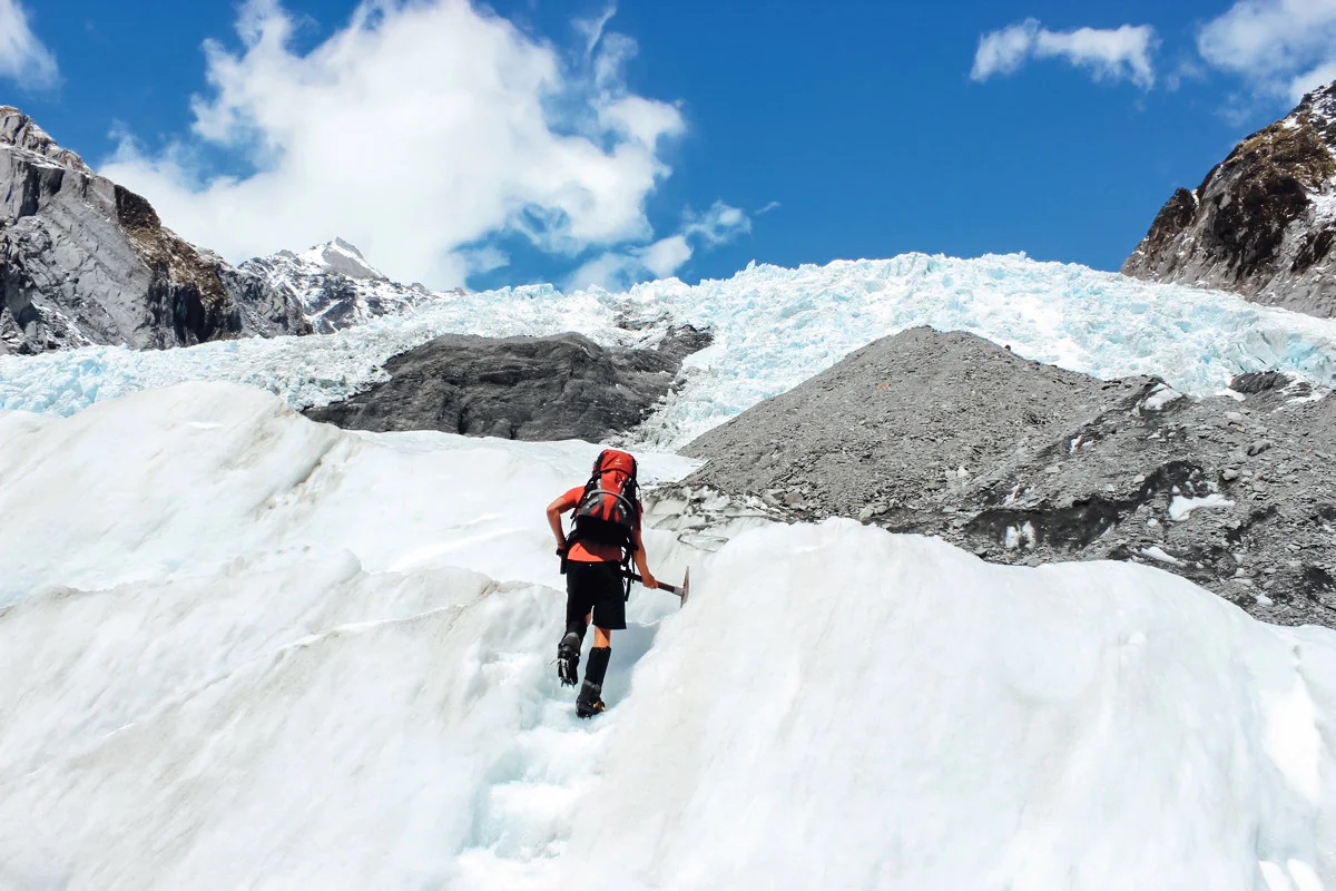 Traveller hiking in mountains