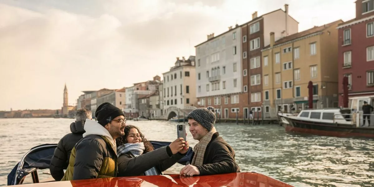 Group Of Friends Taking Photo In Boat