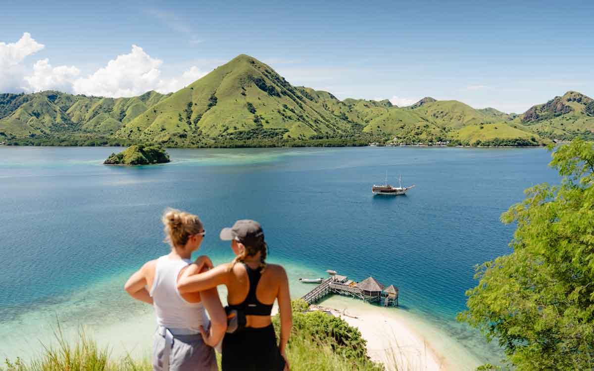 Wome Looking Over Water In Komodo